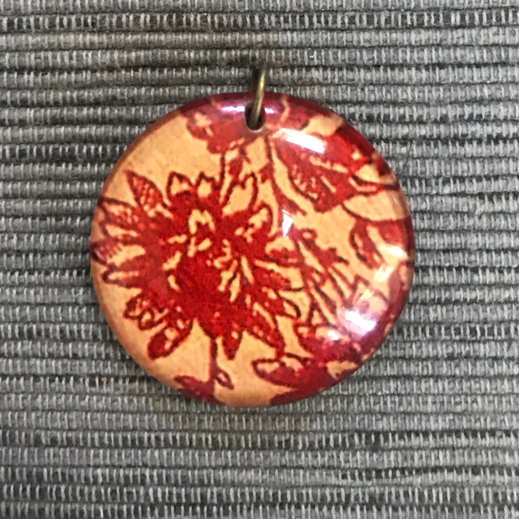 New Resin Round Red & Gold Flowered Charm